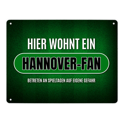 Hier wohnt ein Hannover-Fan Metallschild XL mit Rasen Motiv