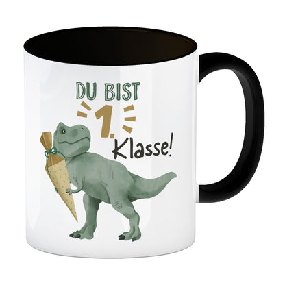 Dino mit Schultüte Kaffeebecher in schwarz mit Spruch Du bist 1. Klasse!