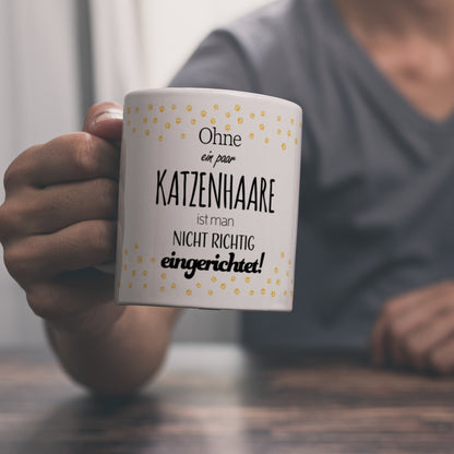 Ohne ein paar Katzenhaare ist man nicht richtig eingerichtet! Kaffeebecher