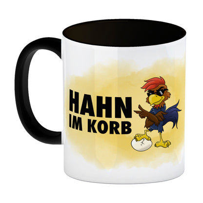 Hahn im Korb Kaffeebecher Schwarz Das einzigartige Cartoon-Motiv eines Hahns macht diesen Kaffeebecher zu einem echt ausgefallenem Geschenk für Kollegen, Familie und Freunde die vielleicht alleine als Hahn im Korb sitzen. mit Cartoon-Hahn, Aufschrift Moti