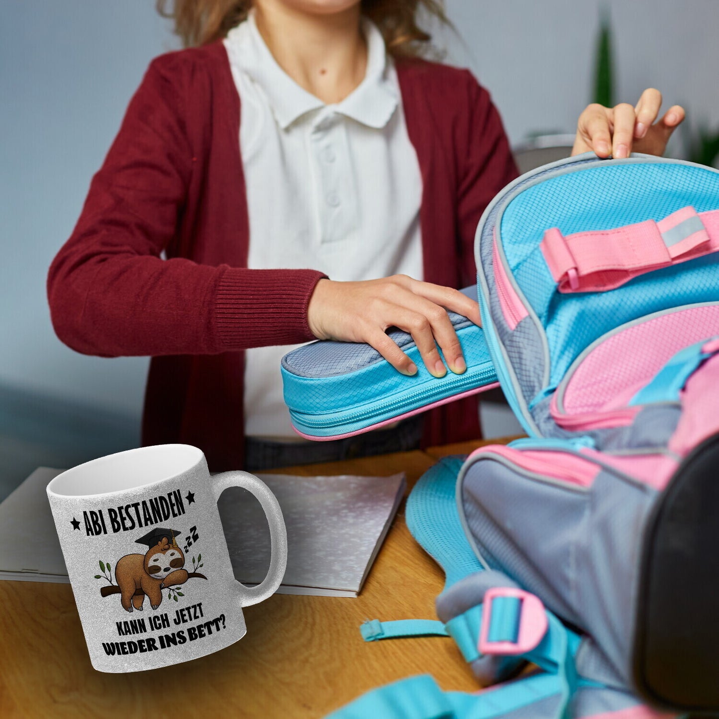 Faultier Abitur Glitzer-Kaffeebecher mit Spruch Abi geschafft zurück ins Bett