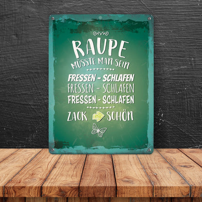 Metallschild mit Spruch: Raupe müsste man sein. Fressen ...