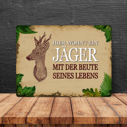 Metallschild XL mit Spruch: Hier wohnt ein Jäger - mit ...