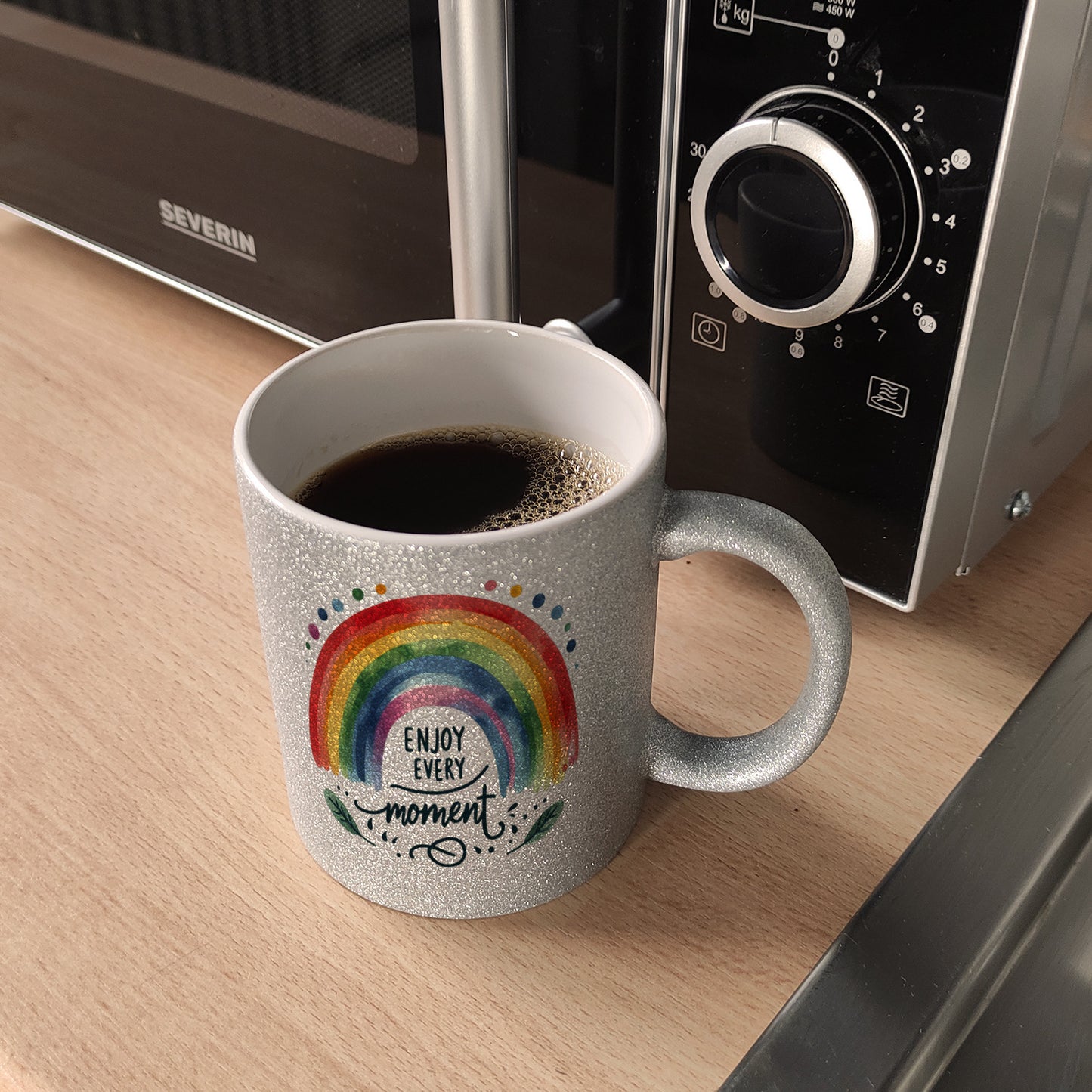 Regenbogen Glitzer-Kaffeebecher mit Spruch Enjoy every moment