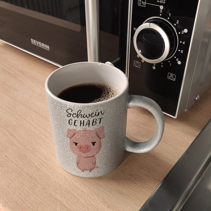 Ferkel Glitzer-Kaffeebecher mit Spruch Schwein gehabt