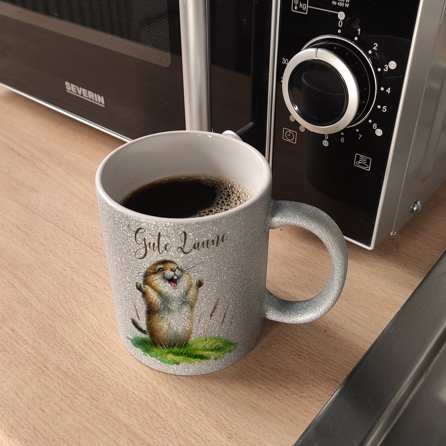 jubelnder Lemming Glitzer-Kaffeebecher mit Spruch Gute Laune