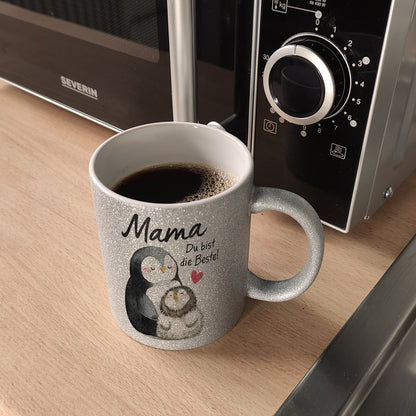 Pinguin Mutter und Kind Glitzer-Kaffeebecher mit Spruch Mama du bist die Beste