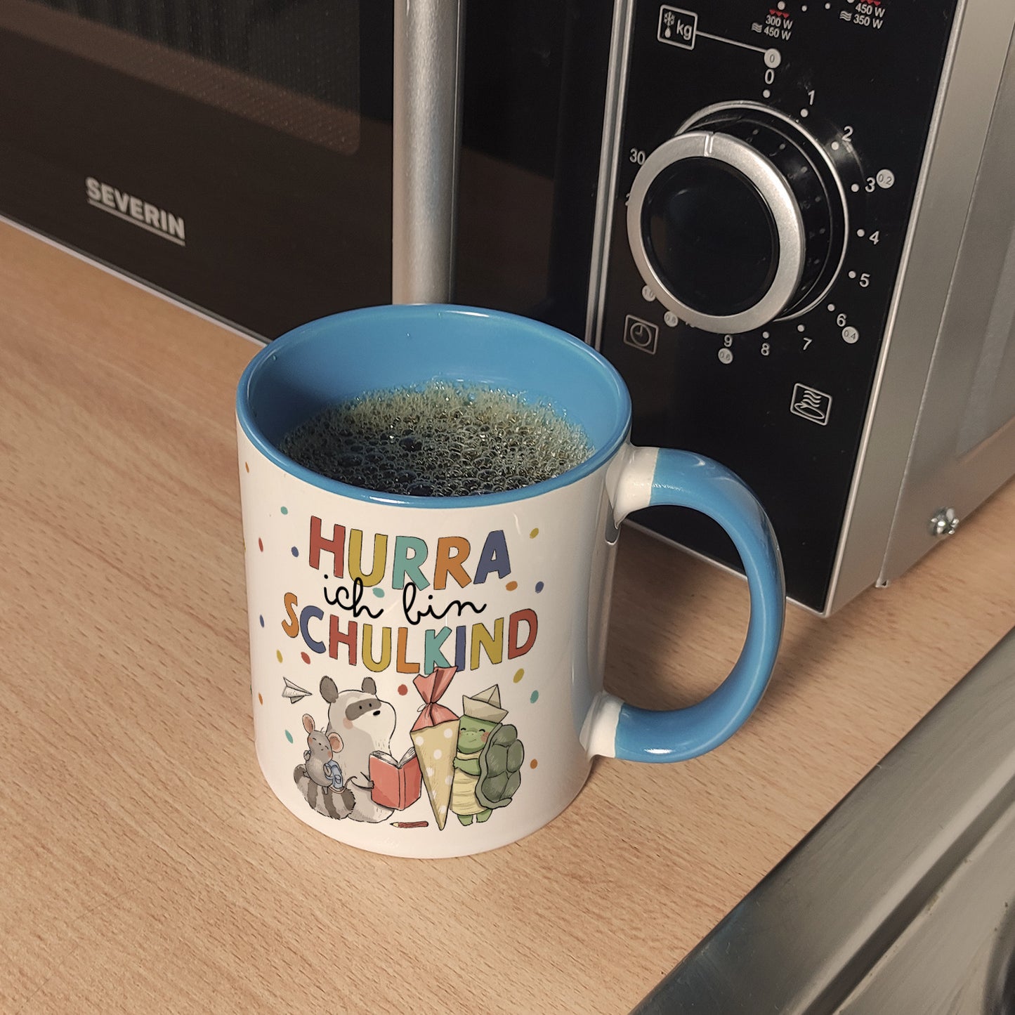 Tiere zur Einschulung Kaffeebecher in hellblau mit Spruch Hurra ich bin Schulkind