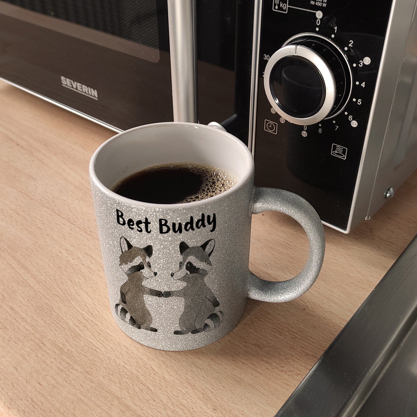 Waschbär Bruder und Kumpel Glitzer-Kaffeebecher mit Spruch Best Buddy