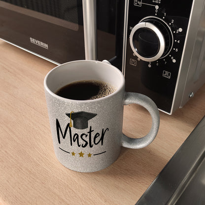 Master bestanden Glitzer-Kaffeebecher mit Masterhut