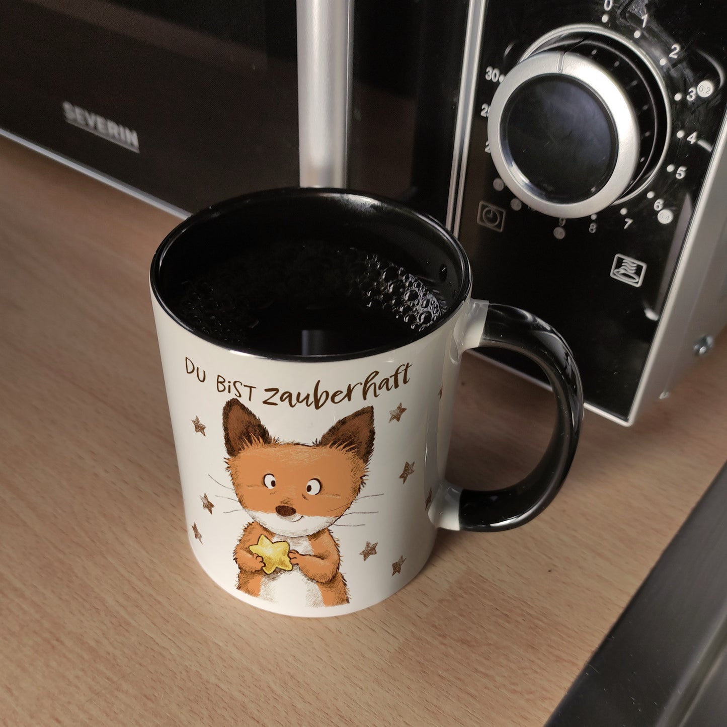 Fuchs Kaffeebecher in schwarz mit Spruch Du bist zauberhaft