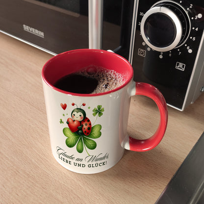 Marienkäfer Kaffeebecher in rot mit Spruch Glaube an Wunder, Liebe und Glück!