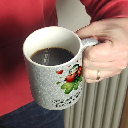 Marienkäfer Glitzer-Kaffeebecher mit Spruch Glaube an Wunder, Liebe und Glück!