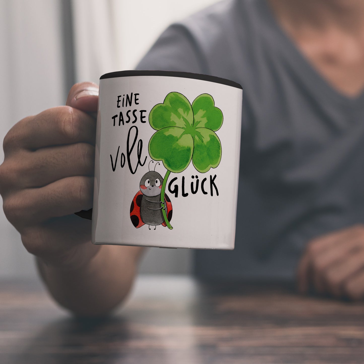 Marienkäfer Kaffeebecher in schwarz mit Spruch Eine Tasse voll Glück