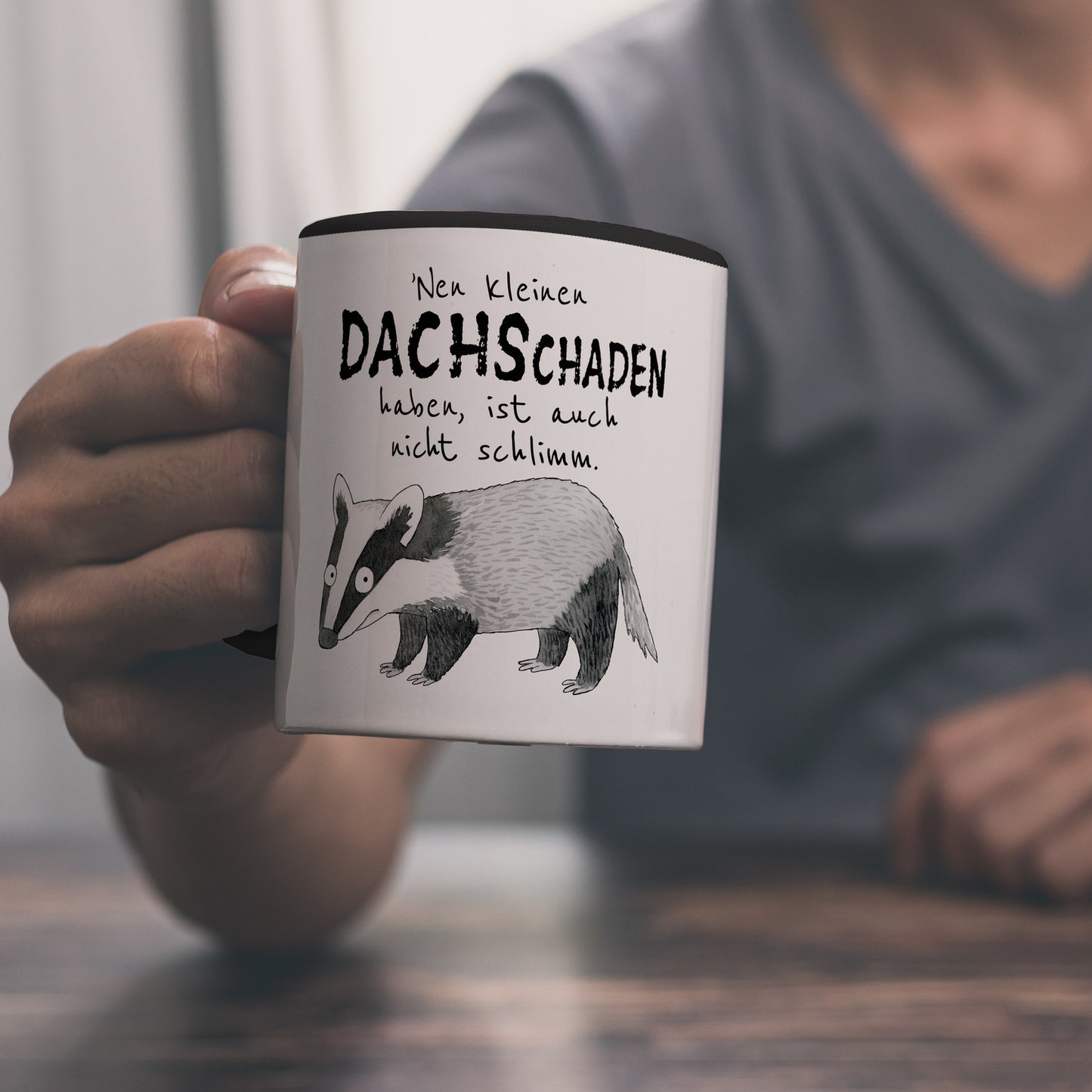 Dachs Kaffeebecher in schwarz mit Spruch Kleiner Dachschaden nicht schlimm