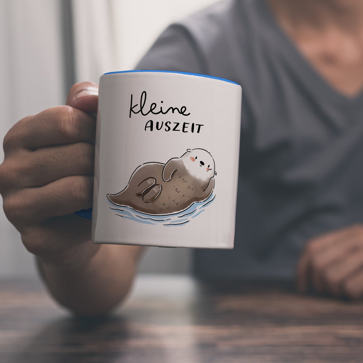 Otter Kaffeebecher in hellblau mit Spruch Kleine Auszeit