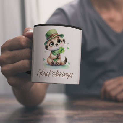 Erdmännchen Glücksbringer Kaffeebecher in schwarz