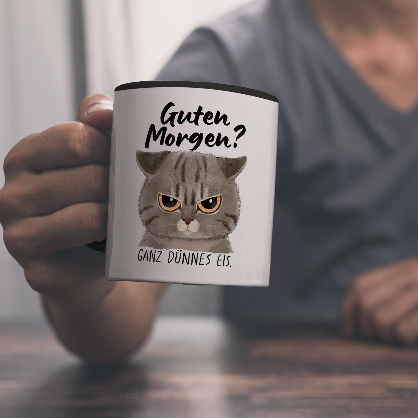 Morgenmuffel Katze Kaffeebecher in schwarz mit Spruch Guten Morgen - Ganz dünnes Eis