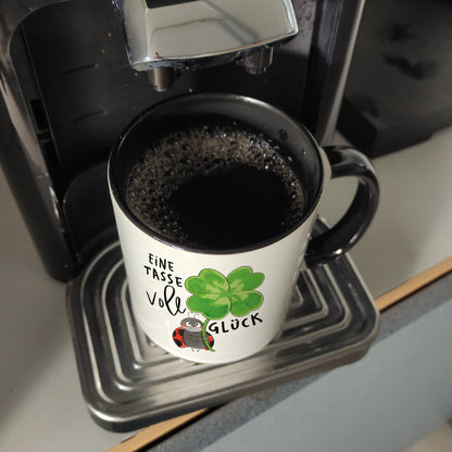 Marienkäfer Kaffeebecher in schwarz mit Spruch Eine Tasse voll Glück