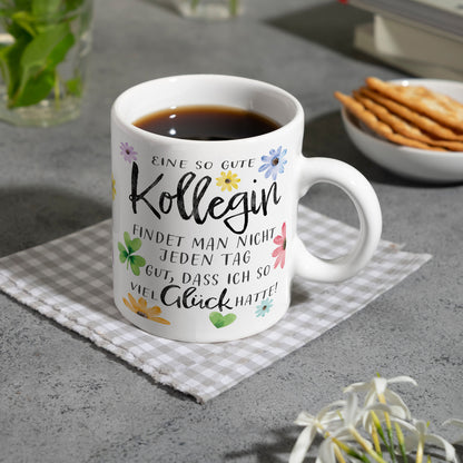 Blumen Kaffeebecher mit Spruch Glück gehabt mit toller Kollegin