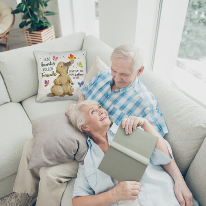 Schnabeltier Kuschelkissen mit Spruch Lebe bunt und freudig